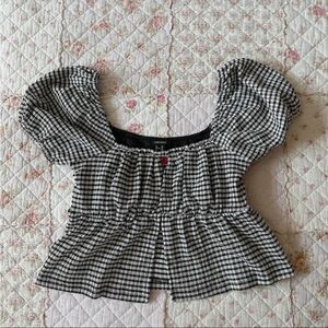 Black and white gingham puff sleeve red rosette top